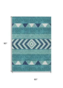 5' X 8' Teal Blue Navy Blue And Ivory Southwestern Washable Indoor Outdoor Area Rug