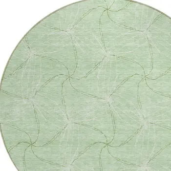 8' Mint Green And Ivory Round Geometric Washable Indoor Outdoor Area Rug