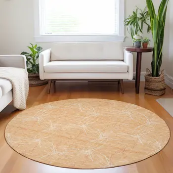 8' Peach And Ivory Round Geometric Washable Indoor Outdoor Area Rug