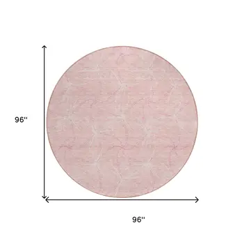 8' Pink And Ivory Round Geometric Washable Indoor Outdoor Area Rug