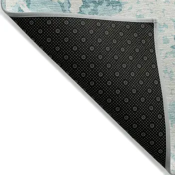 5' X 8' Teal Blue And Ivory Abstract Washable Indoor Outdoor Area Rug