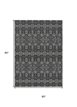 5' X 8' Black And Ivory Tribal Washable Indoor Outdoor Area Rug