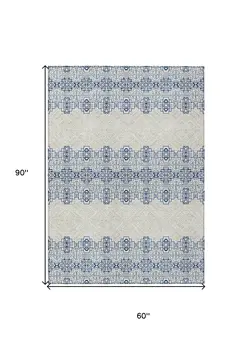 5' X 8' Navy Blue And Ivory Tribal Washable Indoor Outdoor Area Rug