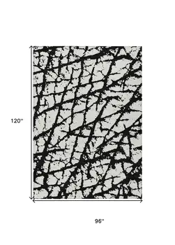8' X 10' Black And Ivory Abstract Washable Indoor Outdoor Area Rug