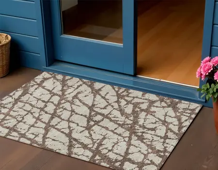 3' X 5' Brown And Ivory Abstract Washable Indoor Outdoor Area Rug