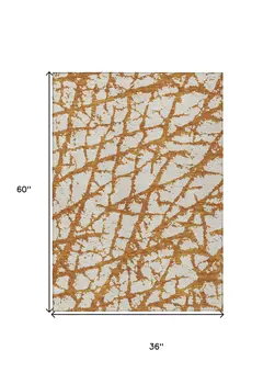 3' X 5' Copper And Ivory Abstract Washable Indoor Outdoor Area Rug