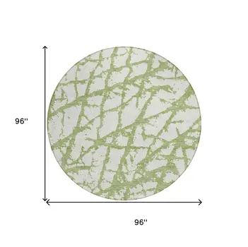 8' Green And Ivory Round Abstract Washable Indoor Outdoor Area Rug