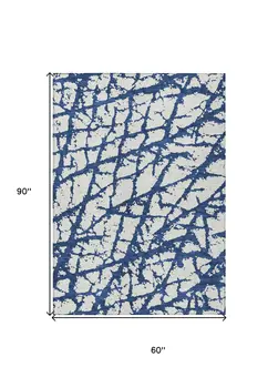5' X 8' Navy Blue And Ivory Abstract Washable Indoor Outdoor Area Rug