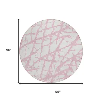 8' Pink And Ivory Round Abstract Washable Indoor Outdoor Area Rug