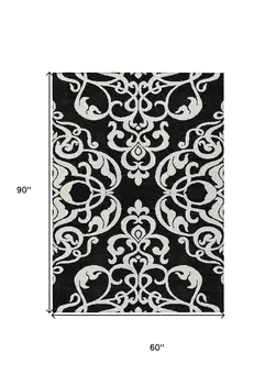 5' X 8' Black And Ivory Damask Washable Indoor Outdoor Area Rug