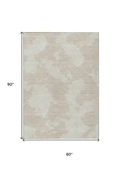 5' X 8' Beige And Ivory Abstract Washable Indoor Outdoor Area Rug