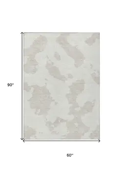 5' X 8' Ivory And Beige Abstract Washable Indoor Outdoor Area Rug