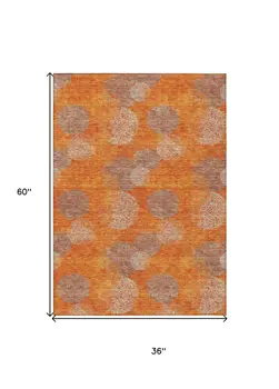 3' X 5' Orange Silver And Peach Polka Dot Washable Indoor Outdoor Area Rug