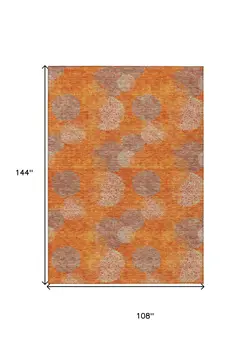 9' X 12' Orange Silver And Peach Polka Dot Washable Indoor Outdoor Area Rug