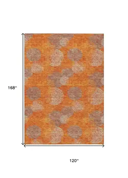 10' X 14' Orange Silver And Peach Polka Dot Washable Indoor Outdoor Area Rug
