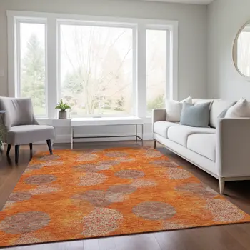 10' X 14' Orange Silver And Peach Polka Dot Washable Indoor Outdoor Area Rug
