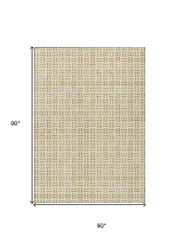 5' X 8' Gold And Ivory Geometric Washable Indoor Outdoor Area Rug