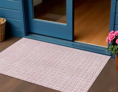 3' X 5' Pink And Ivory Geometric Washable Indoor Outdoor Area Rug