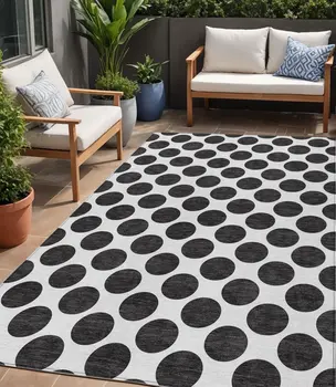 5' X 8' Black And Ivory Polka Dot Washable Indoor Outdoor Area Rug