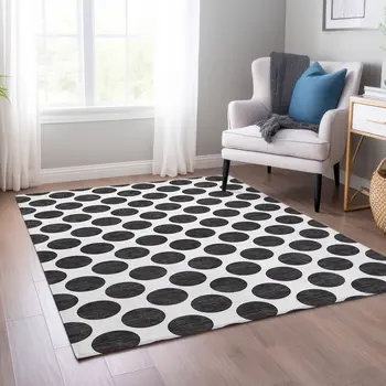 10' X 14' Black And Ivory Polka Dot Washable Indoor Outdoor Area Rug