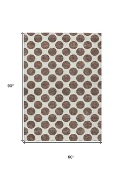 5' X 8' Brown And Ivory Polka Dot Washable Indoor Outdoor Area Rug