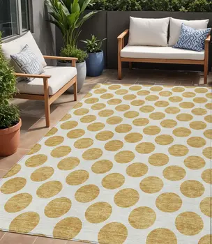 5' X 8' Gold And Ivory Polka Dot Washable Indoor Outdoor Area Rug
