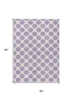 5' X 8' Lavender And Ivory Polka Dot Washable Indoor Outdoor Area Rug