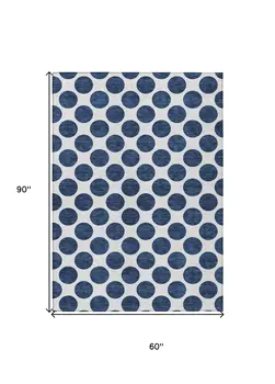 5' X 8' Navy Blue And Ivory Polka Dot Washable Indoor Outdoor Area Rug