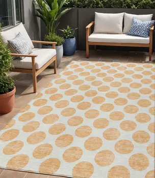 5' X 8' Peach And Ivory Polka Dot Washable Indoor Outdoor Area Rug
