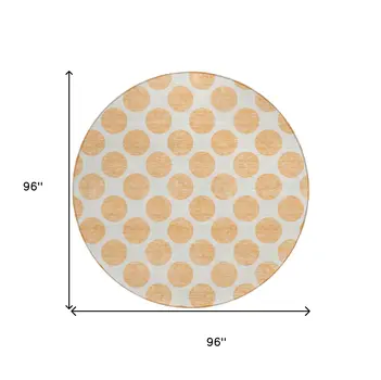 8' Peach And Ivory Round Polka Dot Washable Indoor Outdoor Area Rug