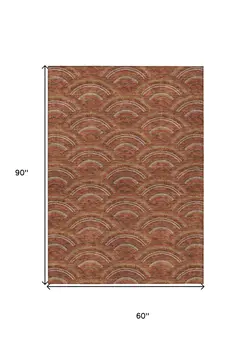 5' X 8' Orange Gold And Ivory Geometric Washable Indoor Outdoor Area Rug