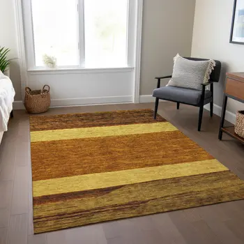 5' X 8' Terra Cotta Gold And Brown Abstract Washable Indoor Outdoor Area Rug