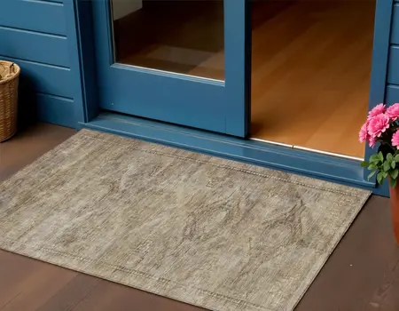 3' X 5' Brown And Taupe Aztec Washable Indoor Outdoor Area Rug