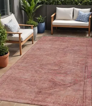 5' X 8' Terra Cotta And Salmon Aztec Washable Indoor Outdoor Area Rug