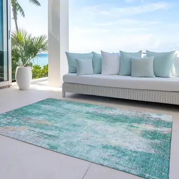 9' X 12' Teal Blue Peach And Ivory Abstract Washable Indoor Outdoor Area Rug