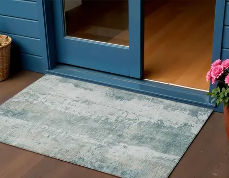 3' X 5' Turquoise And Ivory Abstract Washable Indoor Outdoor Area Rug