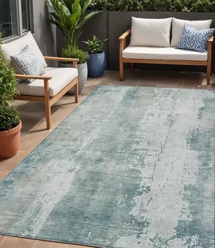 5' X 8' Turquoise And Ivory Abstract Washable Indoor Outdoor Area Rug