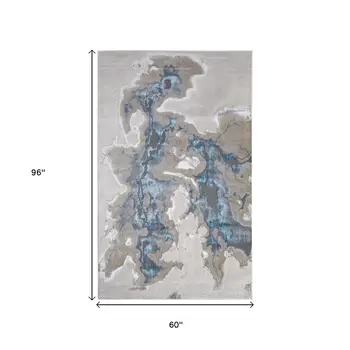 5' X 8' Taupe And Blue Abstract Area Rug