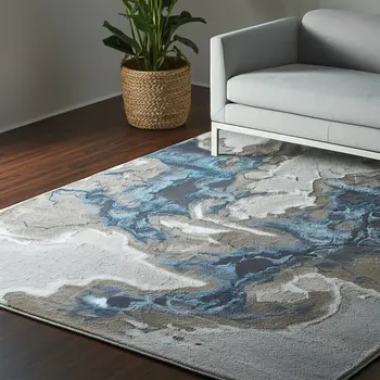 5' X 8' Taupe And Blue Abstract Area Rug