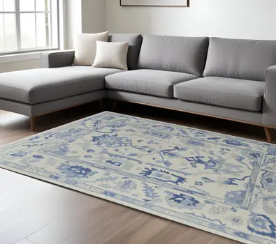 12' X 15' Ivory And Blue Floral Hand Knotted Area Rug With Fringe