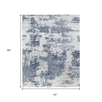 4' X 6' Blue And Ivory Abstract Hand Tufted Area Rug