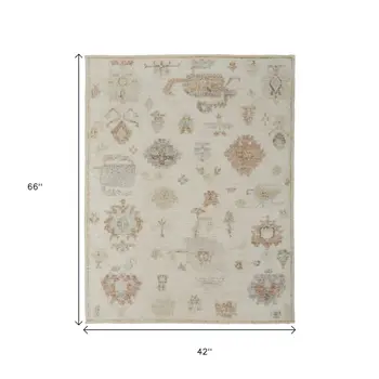 4' X 6' Ivory Orange And Gray Wool Floral Hand Knotted Area Rug
