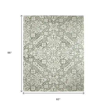 5' X 8' Ivory And Green Floral Hand Tufted Area Rug
