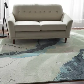 5' X 8' Green Blue And Ivory Abstract Hand Tufted Area Rug