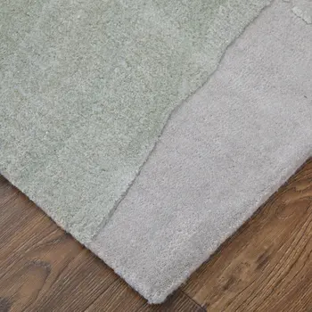 5' X 8' Green Blue And Ivory Abstract Hand Tufted Area Rug