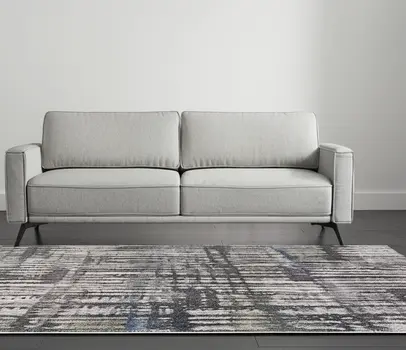 5' X 8' Gray Black And Ivory Abstract Distressed Area Rug