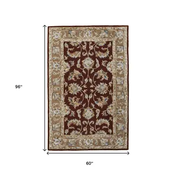5' X 8' Red Tan And Ivory Oriental Hand Tufted Area Rug