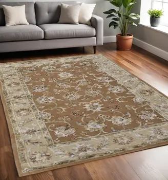 5' X 8' Tan And Ivory Floral Hand Tufted Area Rug