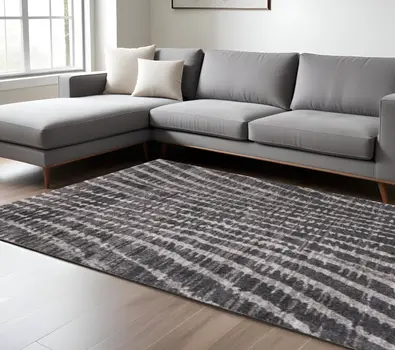 8' X 10' Black Gray And Ivory Abstract Area Rug