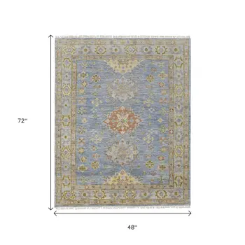 4' X 6' Blue Green And Yellow Geometric Hand Knotted Area Rug With Fringe